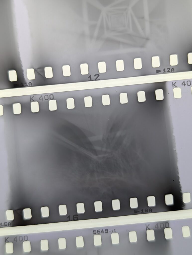 This close-up on photographic negatives shows two negatives that have accidentally been exposed several times.